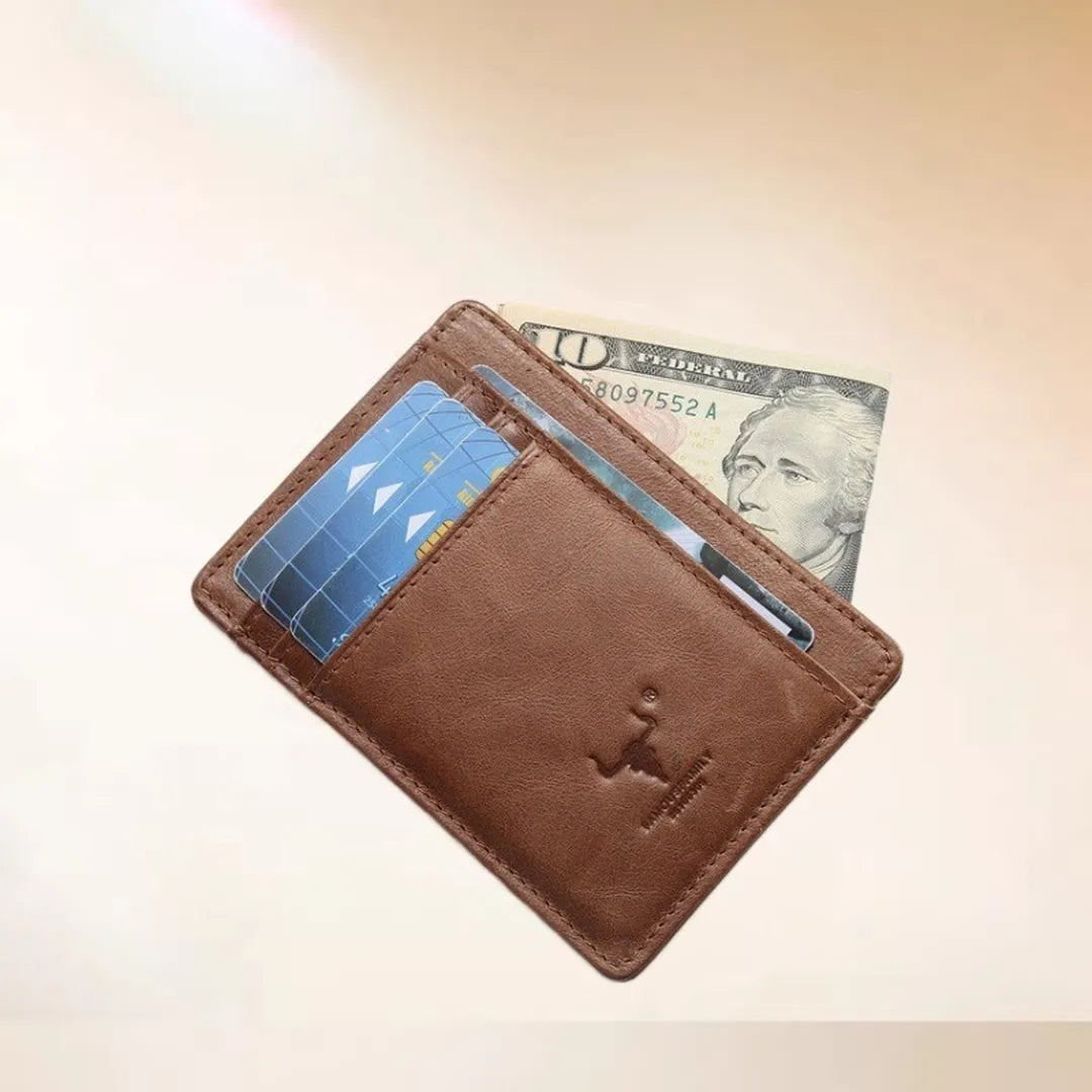 MING CLAN brown top-grain leather minimalist card holder, angled view showing multiple card slots and middle compartment with folded cash.