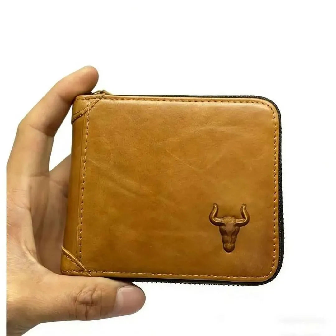 Close-up front view of MING CLAN brown vintage genuine leather zip-around bifold wallet held in hand.