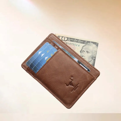 MING CLAN brown top-grain leather minimalist card holder, angled view showing multiple card slots and middle compartment with folded cash.