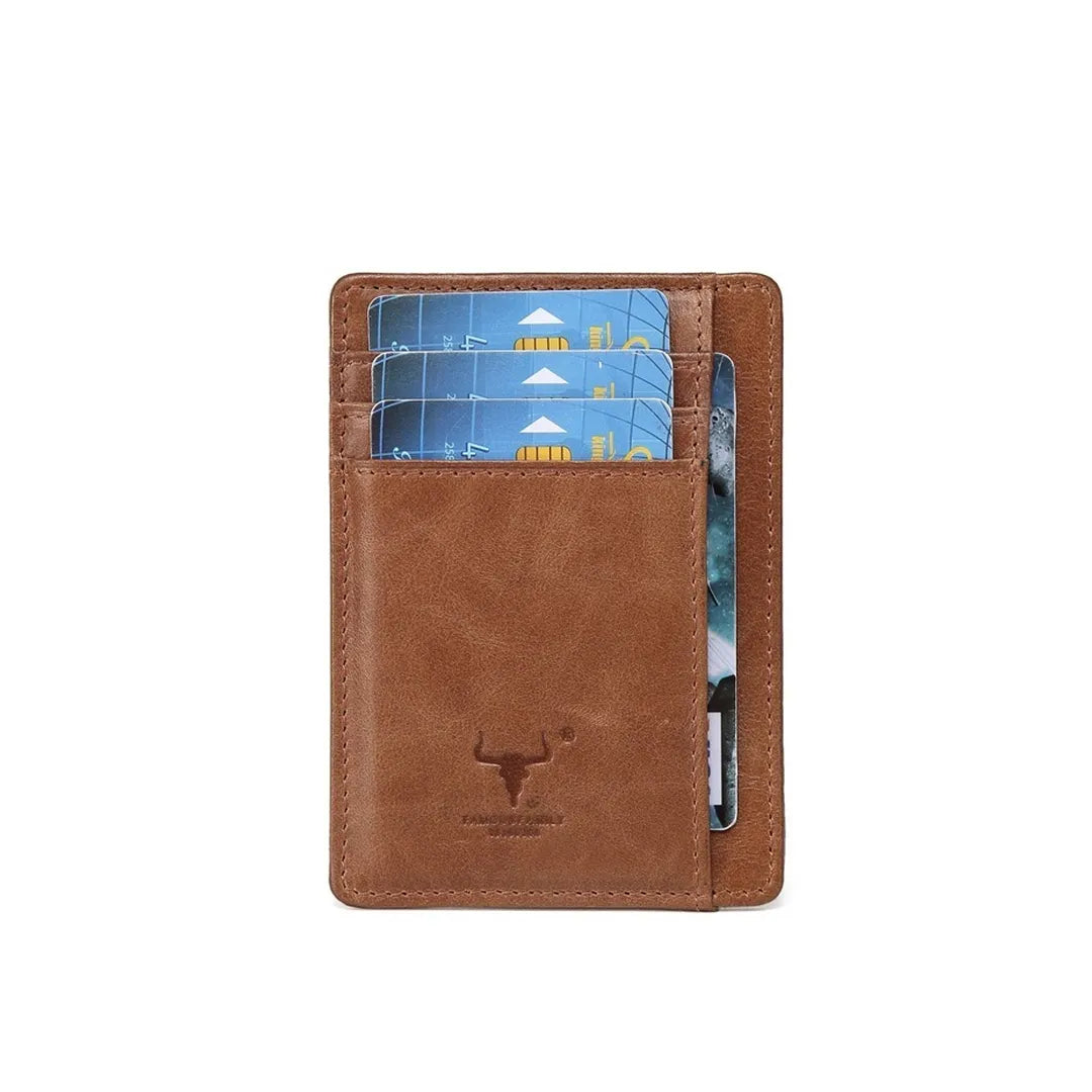 MING CLAN brown ultra-slim leather card sleeve - Front view displaying credit cards in quick-access slots and embossed bull logo.