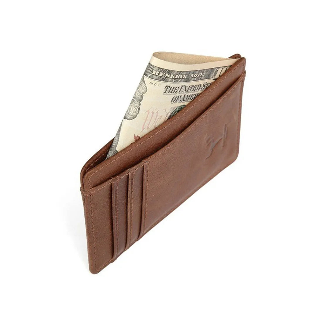 MING CLAN slim brown leather card holder standing upright, holding folded US dollar bills in the center slot.