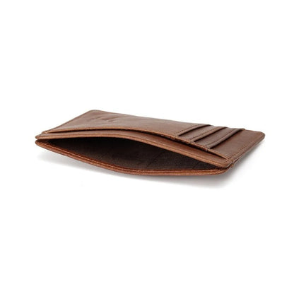 MING CLAN brown minimalist card holder - Close-up of the spacious middle compartment designed for receipts and folded bills